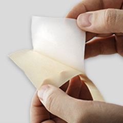 Self-adhesive films with a protection film